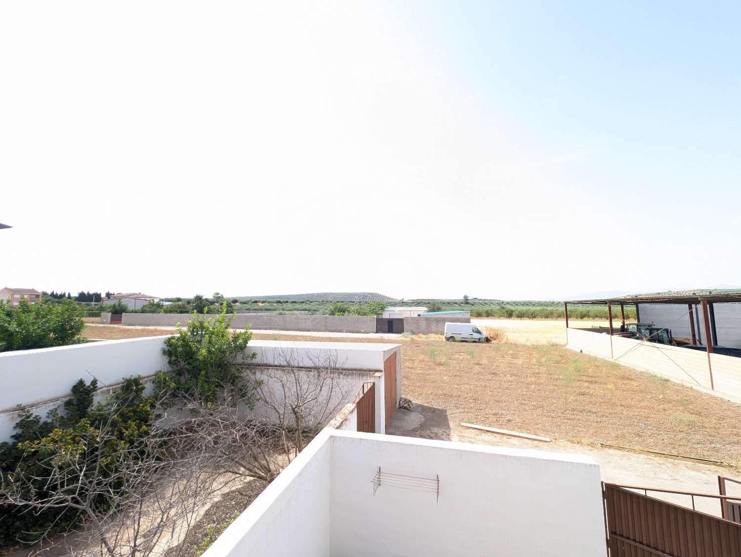 Authentic Andalusian Townhouse for Sale in Tocón, Granada – Terrace, Large Patio & Apartment Potential