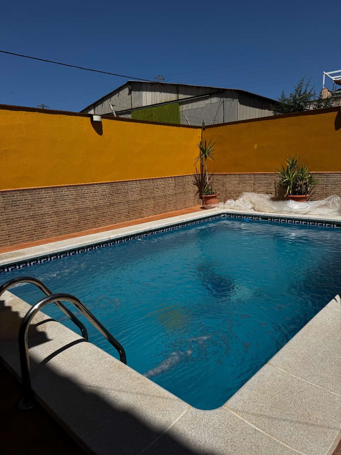 Modern townhouse with private pool and sunny patio located 30 mins to Granada city and an hour to Malaga